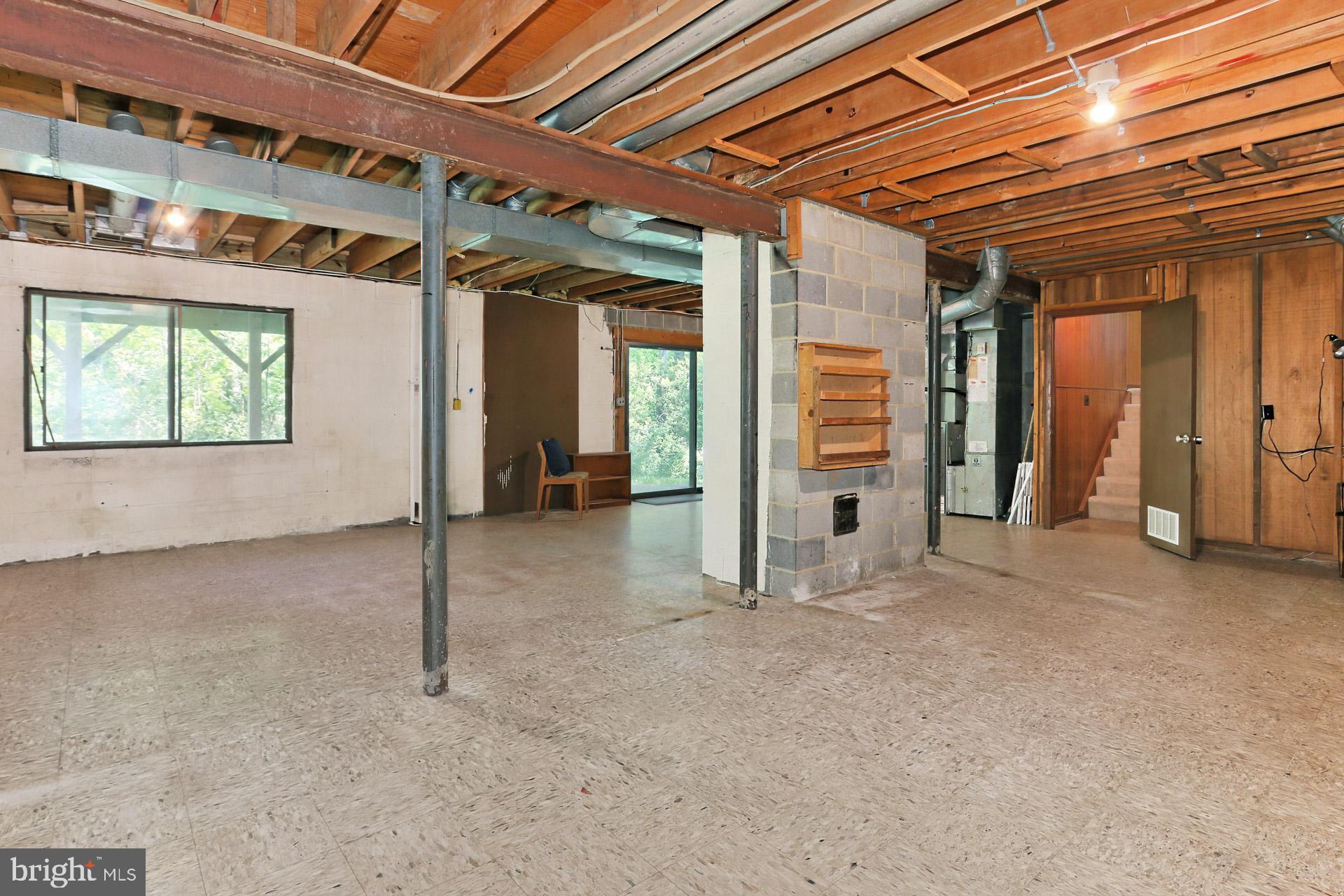 11302 Fieldstone Lane Reston, VA 20191 - Photo 37 of 48 Unfinished Walk-Out Basement