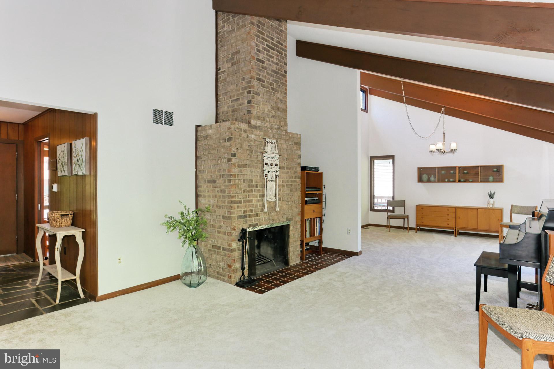 11302 Fieldstone Lane Reston, VA 20191 - Photo 48 of 48 Wooden Beams Highlight the Open Floorplan