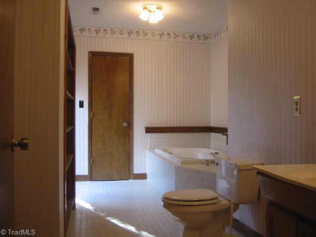 5750 Loop Road Clemmons, NC 27012 - Photo 6 of 9 Other. Full bath in lower level also for pool guest to use. Tile floors and Jetted Jacuzzi style tub. Very stylish !