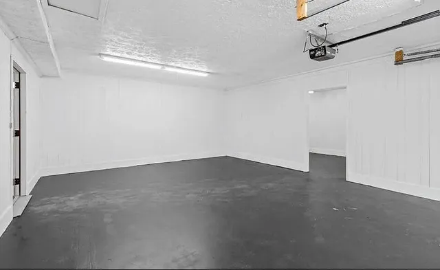 a view of a room with racks on the wall