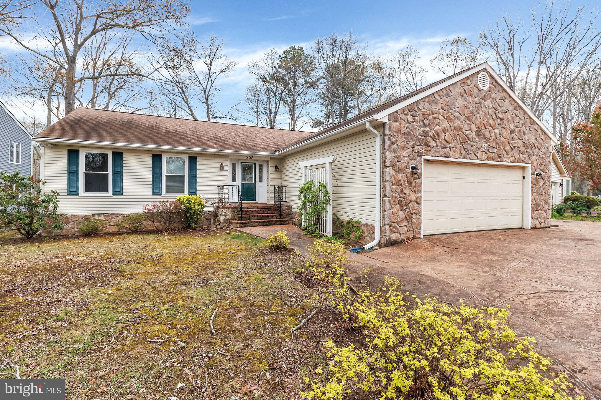 205 Fairway Drive Locust Grove, VA 22508 - Photo 2 of 26 a view of a house with backyard and trees