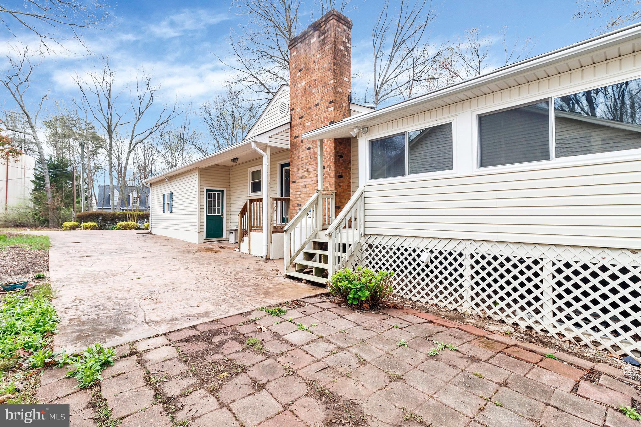 205 Fairway Drive Locust Grove, VA 22508 - Photo 25 of 26 a front view of a house with a yard