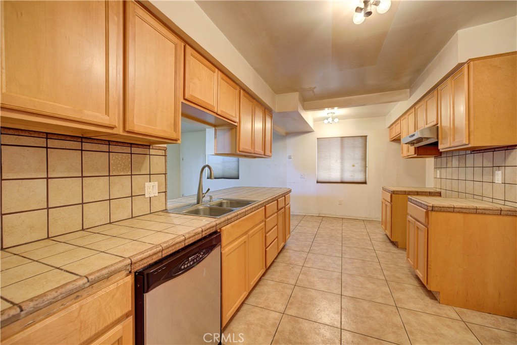 4579 11th Street Guadalupe, CA 93434 - Photo 15 of 40 a kitchen with a sink and cabinets
