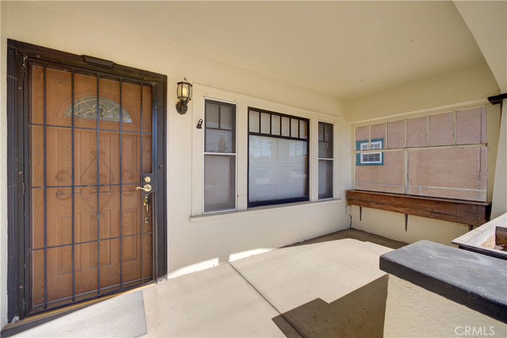 4579 11th Street Guadalupe, CA 93434 - Photo 4 of 40 a hallway with cabinet and refrigerator