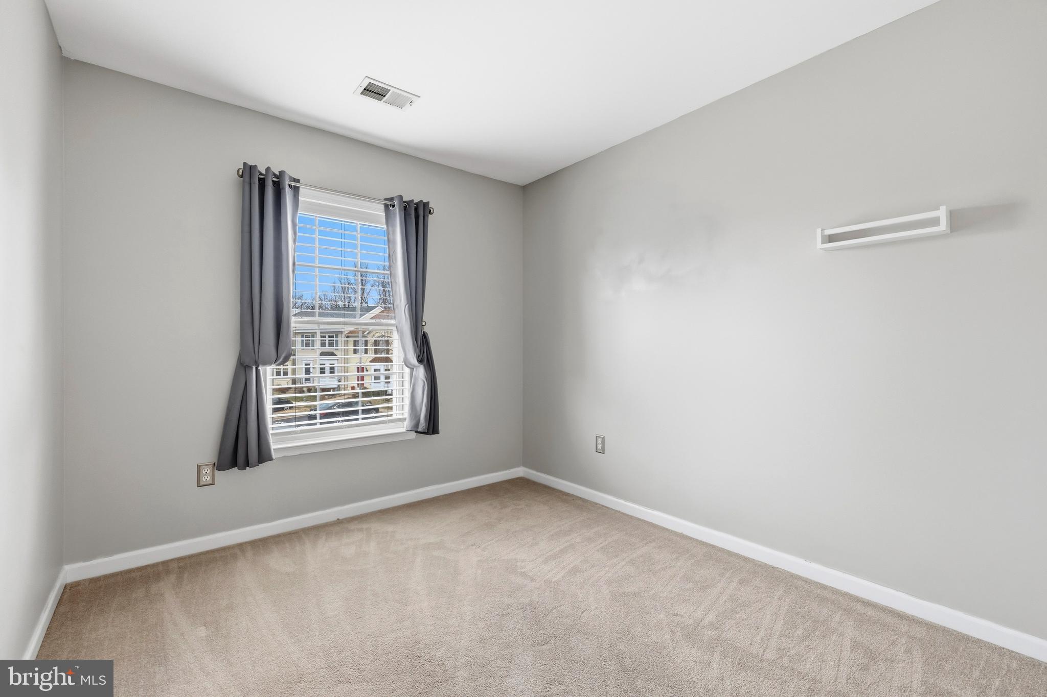 2030 Rosecrans Court Frederick, MD 21702 - Photo 18 of 33 a view of an empty room with a window