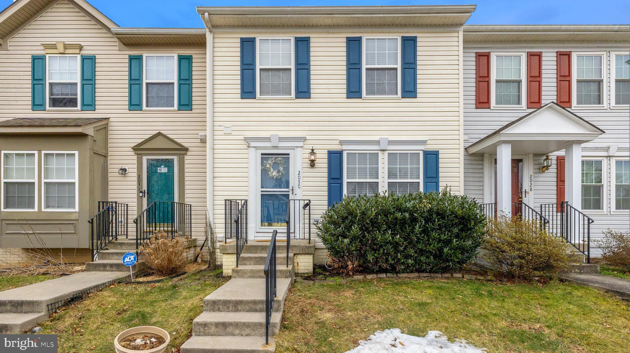 2030 Rosecrans Court Frederick, MD 21702 - Photo 2 of 33 a front view of a house with garden