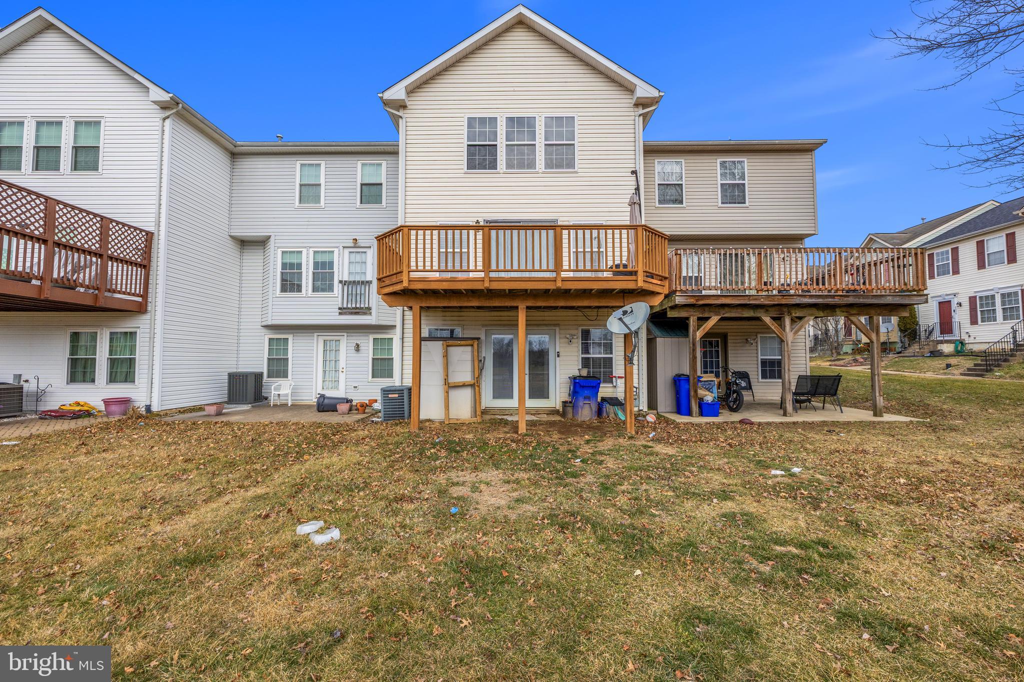 2030 Rosecrans Court Frederick, MD 21702 - Photo 32 of 33 a view of a house with large windows and a outdoor space