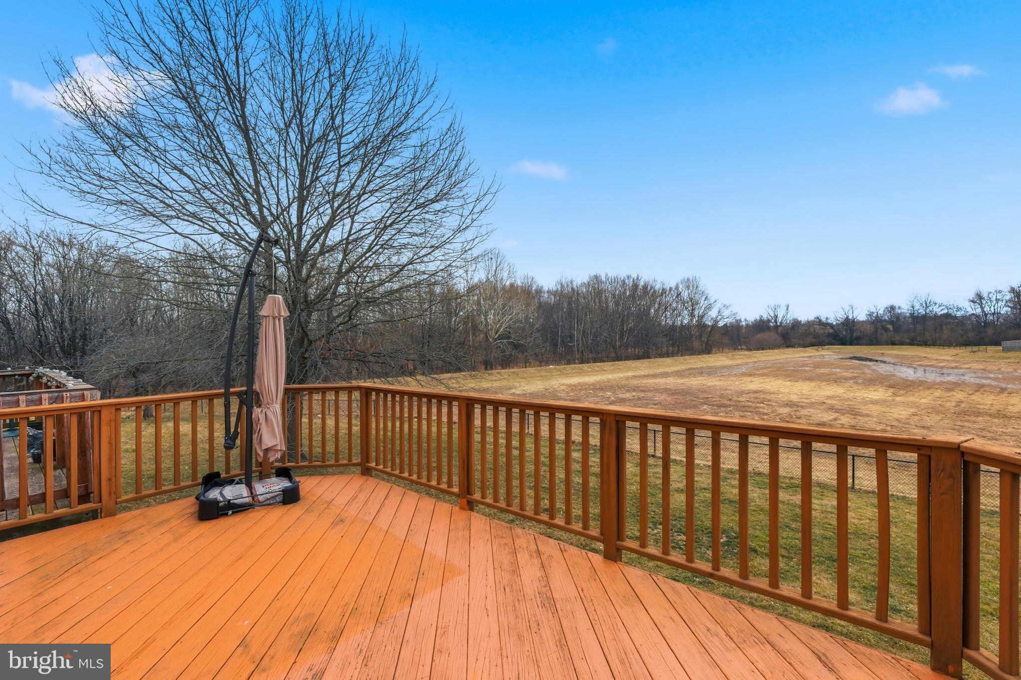 2030 Rosecrans Court Frederick, MD 21702 - Photo 33 of 33 a view of balcony with wooden floor and fence