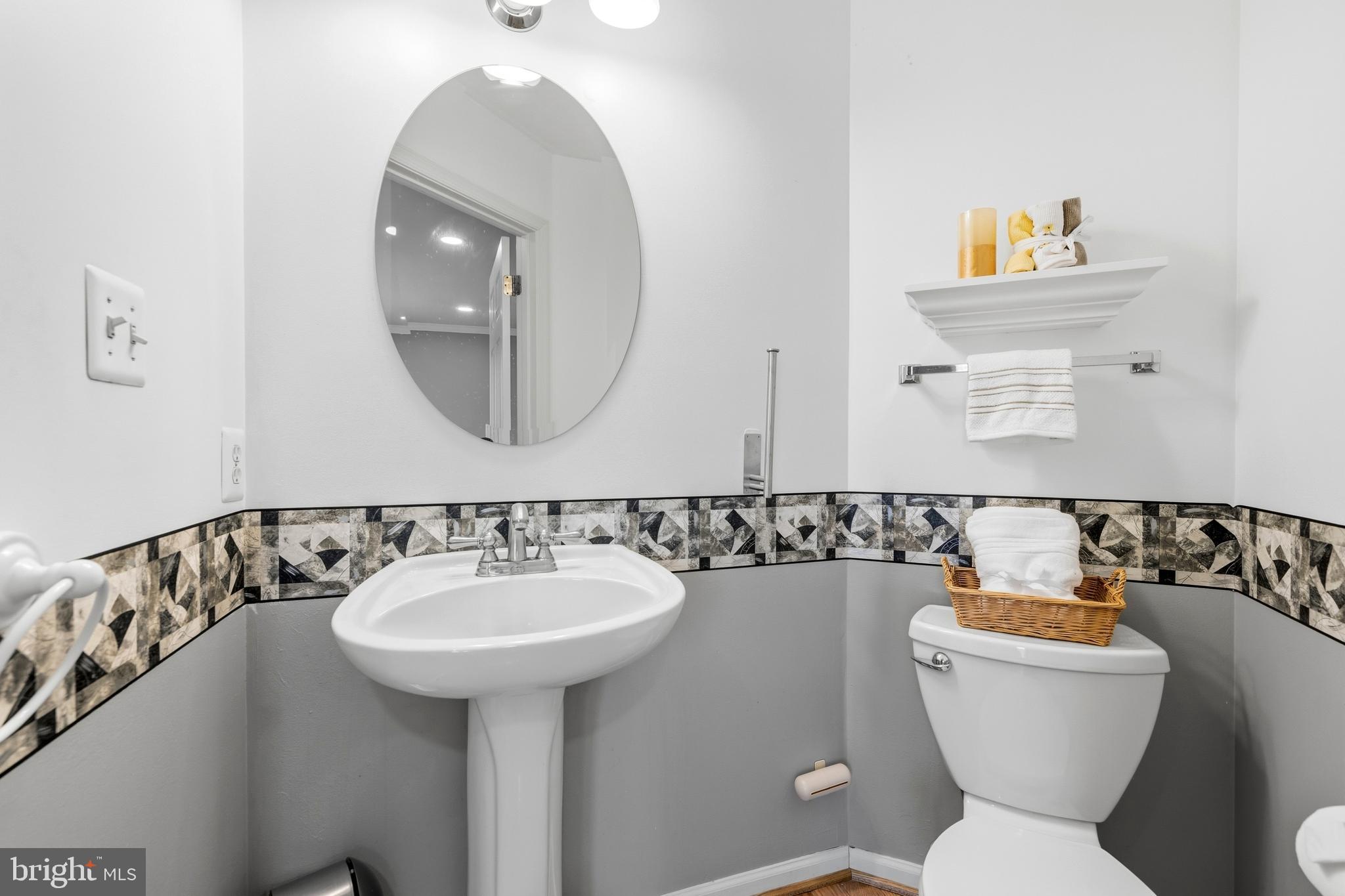2030 Rosecrans Court Frederick, MD 21702 - Photo 5 of 33 a bathroom with a toilet sink and mirror