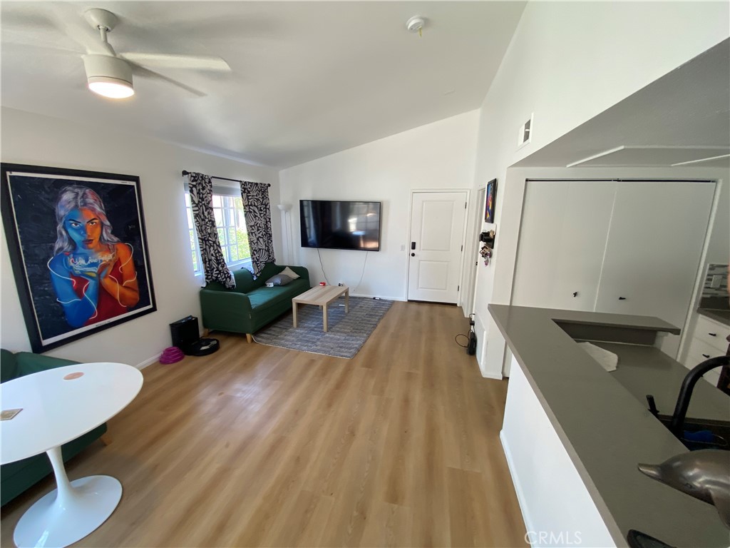 732 Eastshore Terrace, Unit 77 Chula Vista, CA 91913 - Photo 15 of 19 a living room with furniture and a flat screen tv