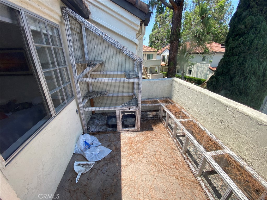 732 Eastshore Terrace, Unit 77 Chula Vista, CA 91913 - Photo 9 of 19 a view of deck with chairs and wooden fence