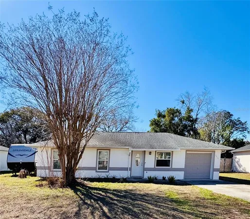 a view of house with outdoor space and swimming pool
