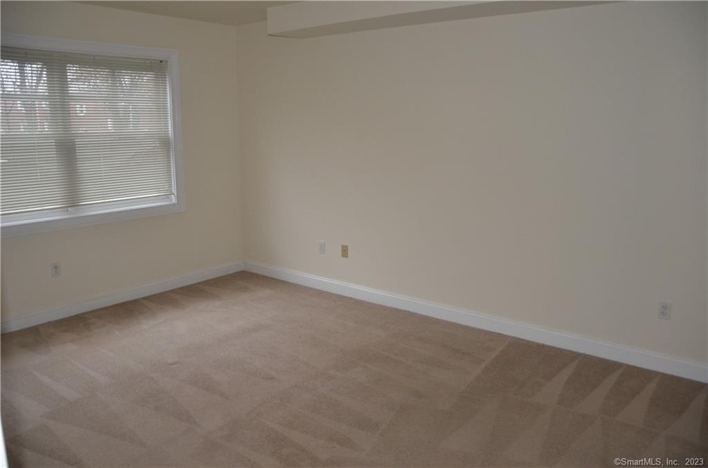 365 Westport Avenue, Unit 2B Norwalk, CT 06851 - Photo 15 of 19 an empty room with a window