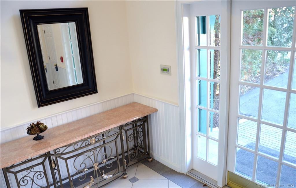 365 Westport Avenue, Unit 2B Norwalk, CT 06851 - Photo 5 of 19 a bathroom with a sink and a mirror