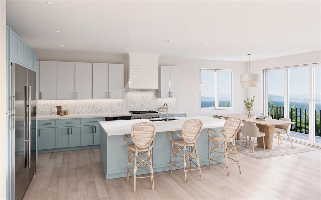 3020 Clinton Street South Gulfport, FL 33707 - Photo 5 of 11 a kitchen with a dining table chairs and white cabinets