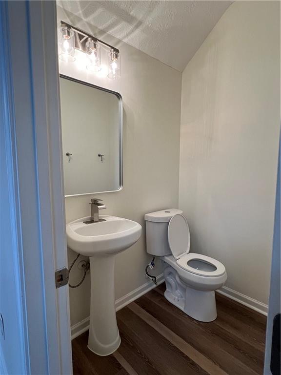 3815 Roses Trail Fairburn, GA 30213 - Photo 5 of 15 a bathroom with a sink toilet and mirror