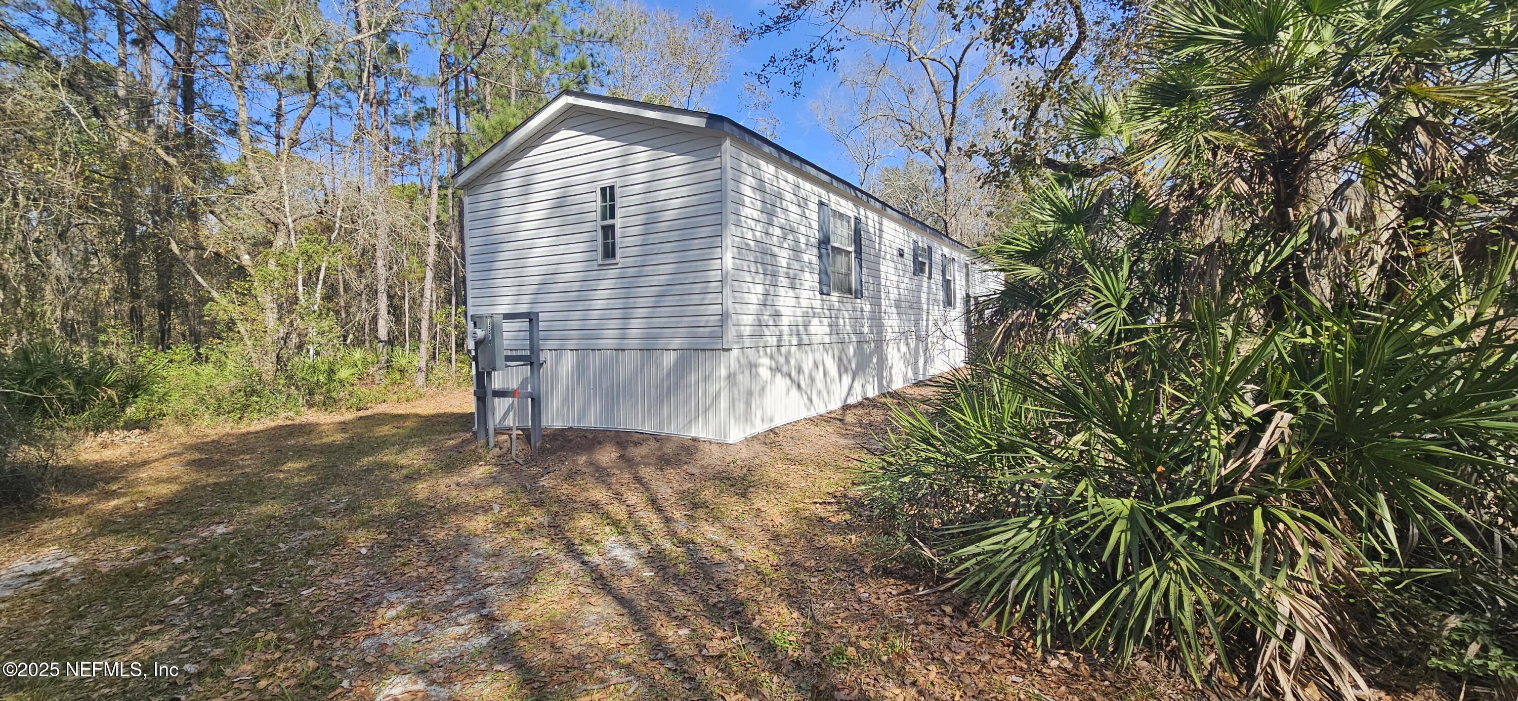 1570 Bluejay Drive Middleburg, FL 32068 - Photo 17 of 17 a view of backyard of a house