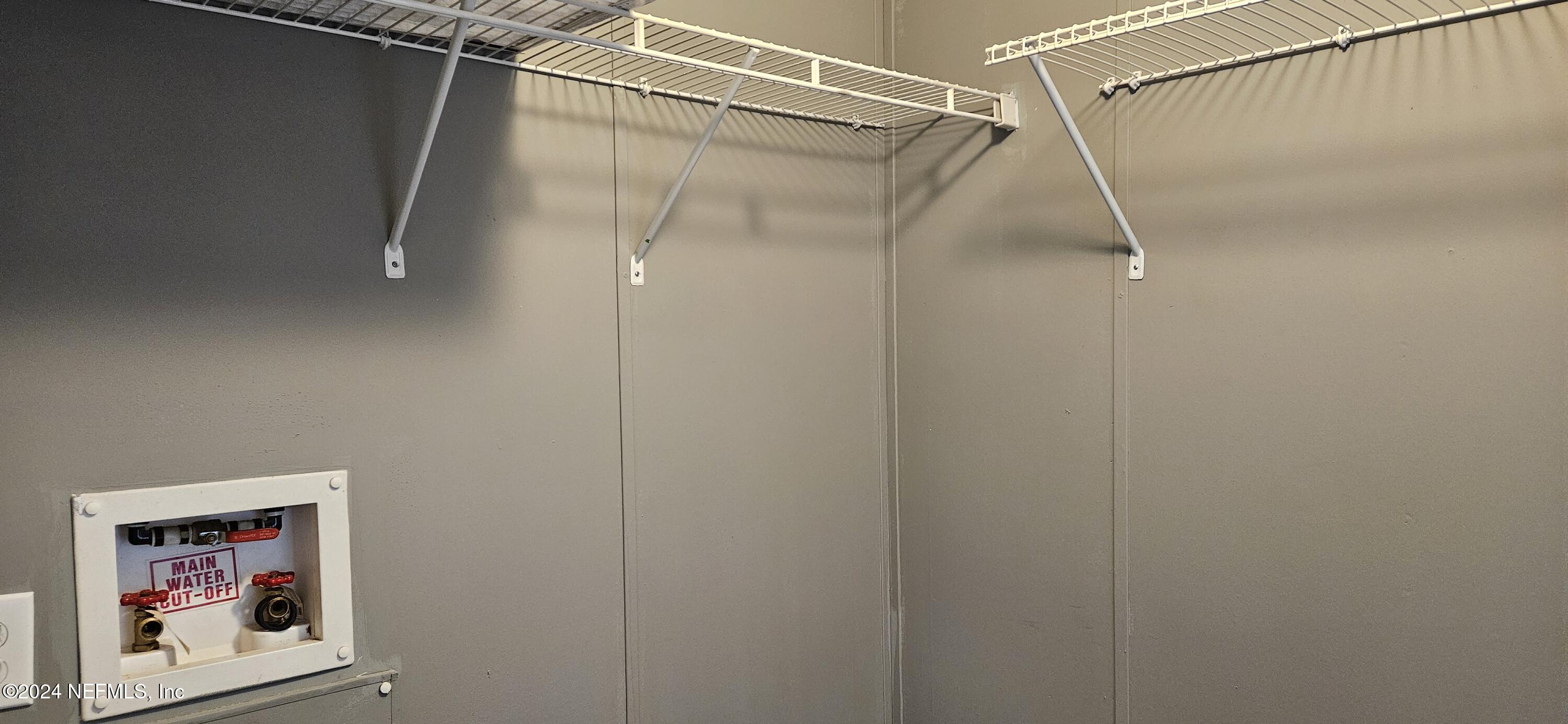 1570 Bluejay Drive Middleburg, FL 32068 - Photo 7 of 17 a bathroom with a shower and a shower head