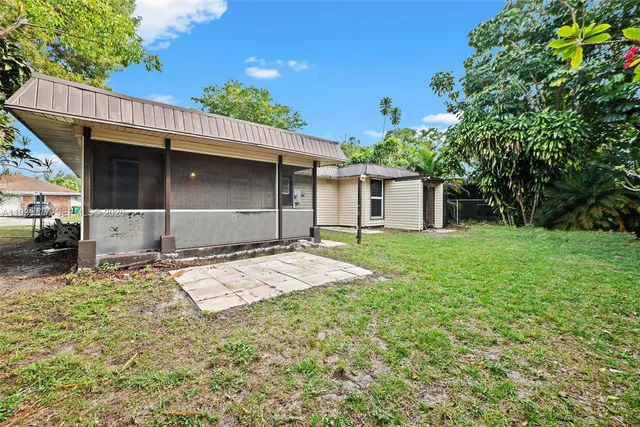 a house with yard in front of it