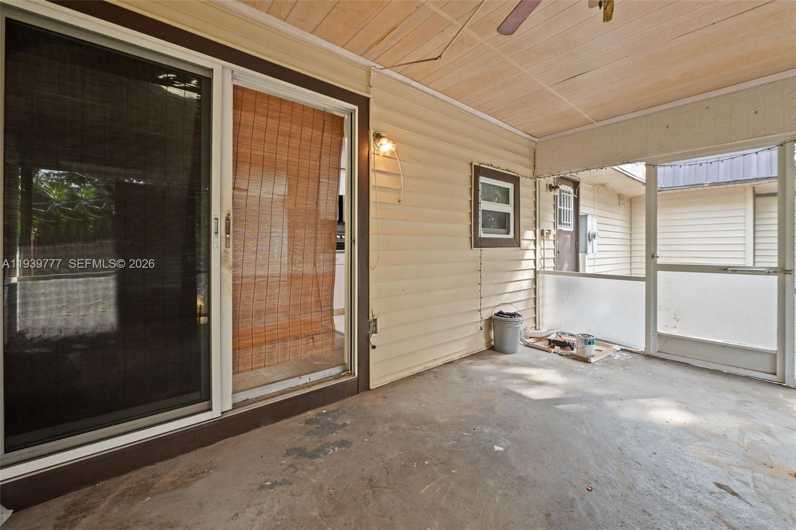 8001 Northwest 68th Terrace Tamarac, FL 33321 - Photo 27 of 27 a view of empty room with wooden floor