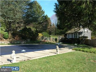 6 Rabbit Run Road Malvern, PA 19355 - Photo 3 of 12 a front view of a house with garden