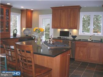 6 Rabbit Run Road Malvern, PA 19355 - Photo 6 of 12 a kitchen with stainless steel appliances granite countertop a sink stove and cabinets