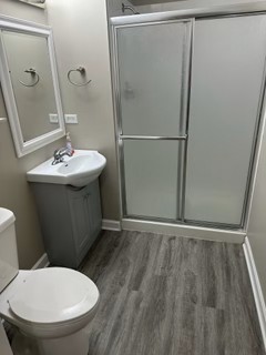 1529 South State Street, Unit 4B Chicago, IL 60605 - Photo 8 of 16 a bathroom with a sink and toilet