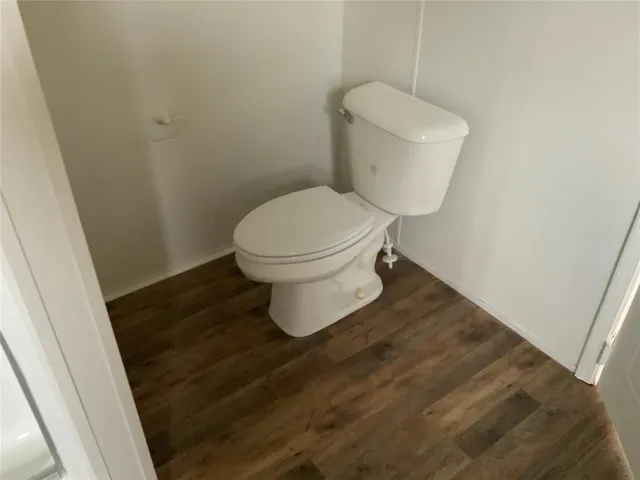 a bathroom with a toilet and a sink