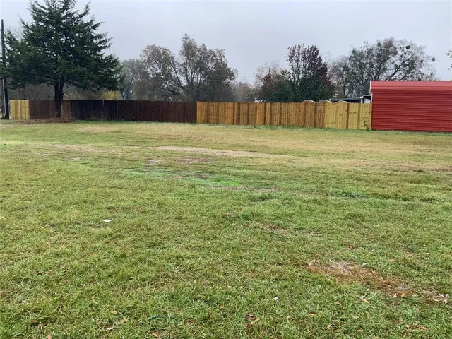 a view of a yard with an outdoor space