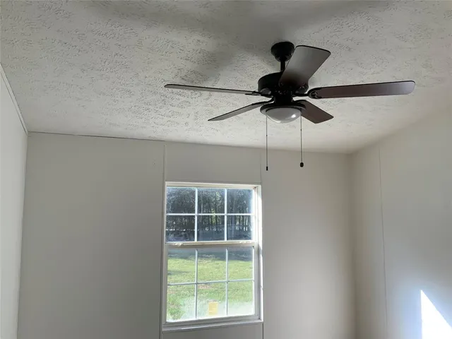 a lamp on a table in a room