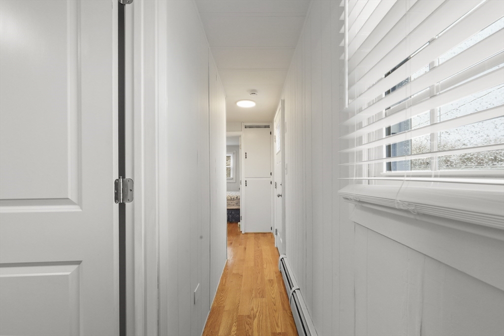 8 Madeline Street Wareham, MA 02538 - Photo 14 of 28 a view of a bathroom from the hallway