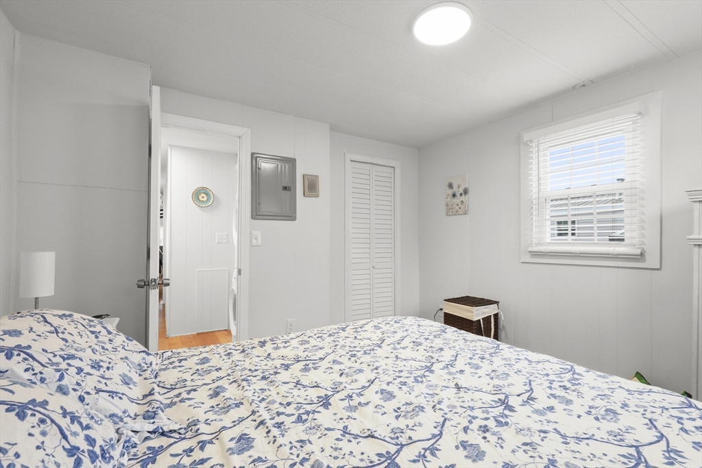 8 Madeline Street Wareham, MA 02538 - Photo 17 of 28 a bedroom with a bed and a window