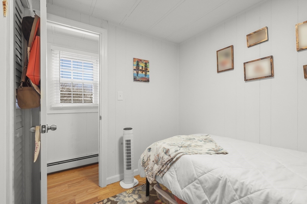 8 Madeline Street Wareham, MA 02538 - Photo 19 of 28 a bedroom with a bed and a window