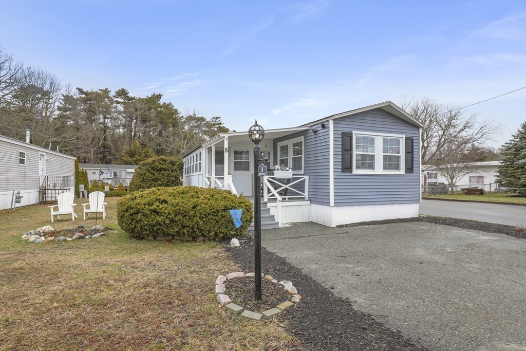 8 Madeline Street Wareham, MA 02538 - Photo 23 of 28 a front view of a house with a yard
