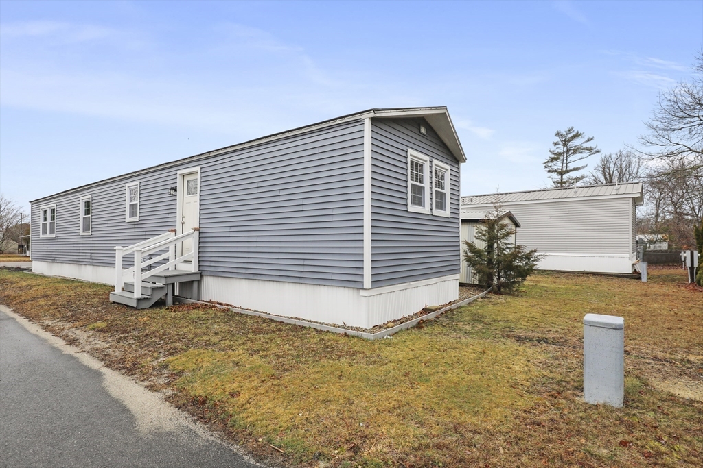 8 Madeline Street Wareham, MA 02538 - Photo 25 of 28 a view of a house with backyard and sitting area