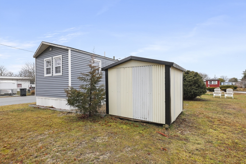8 Madeline Street Wareham, MA 02538 - Photo 26 of 28 a view of a house with backyard and sitting area