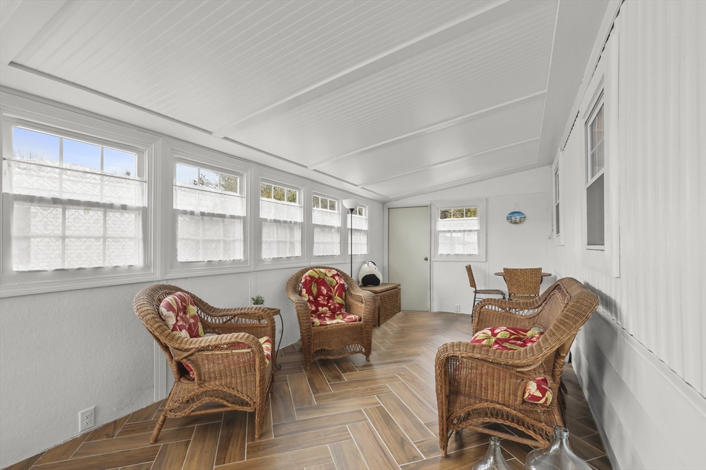 8 Madeline Street Wareham, MA 02538 - Photo 6 of 28 a living room with furniture and a flat screen tv