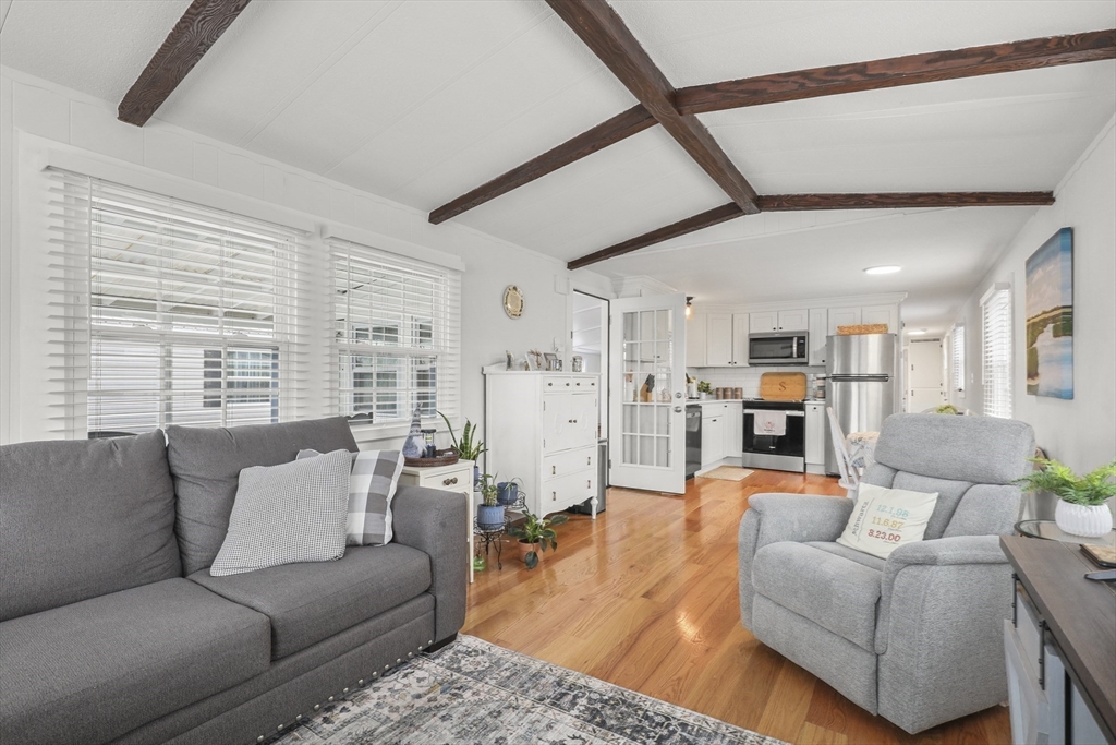 8 Madeline Street Wareham, MA 02538 - Photo 10 of 28 a living room with furniture and a large window