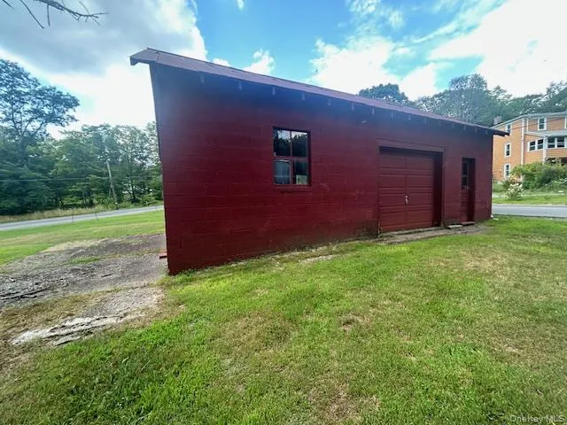 a view of a backyard of the house