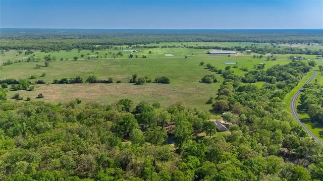 a view of a garden with a lake view