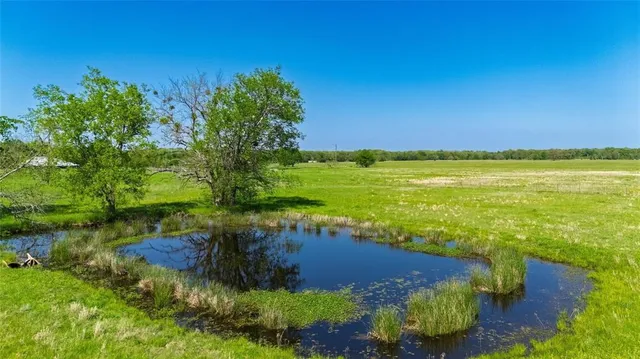 a view of a lake with outdoor space