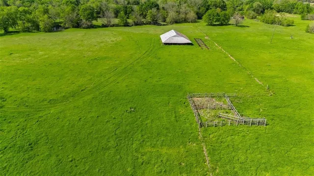 a view of a golf course with a garden