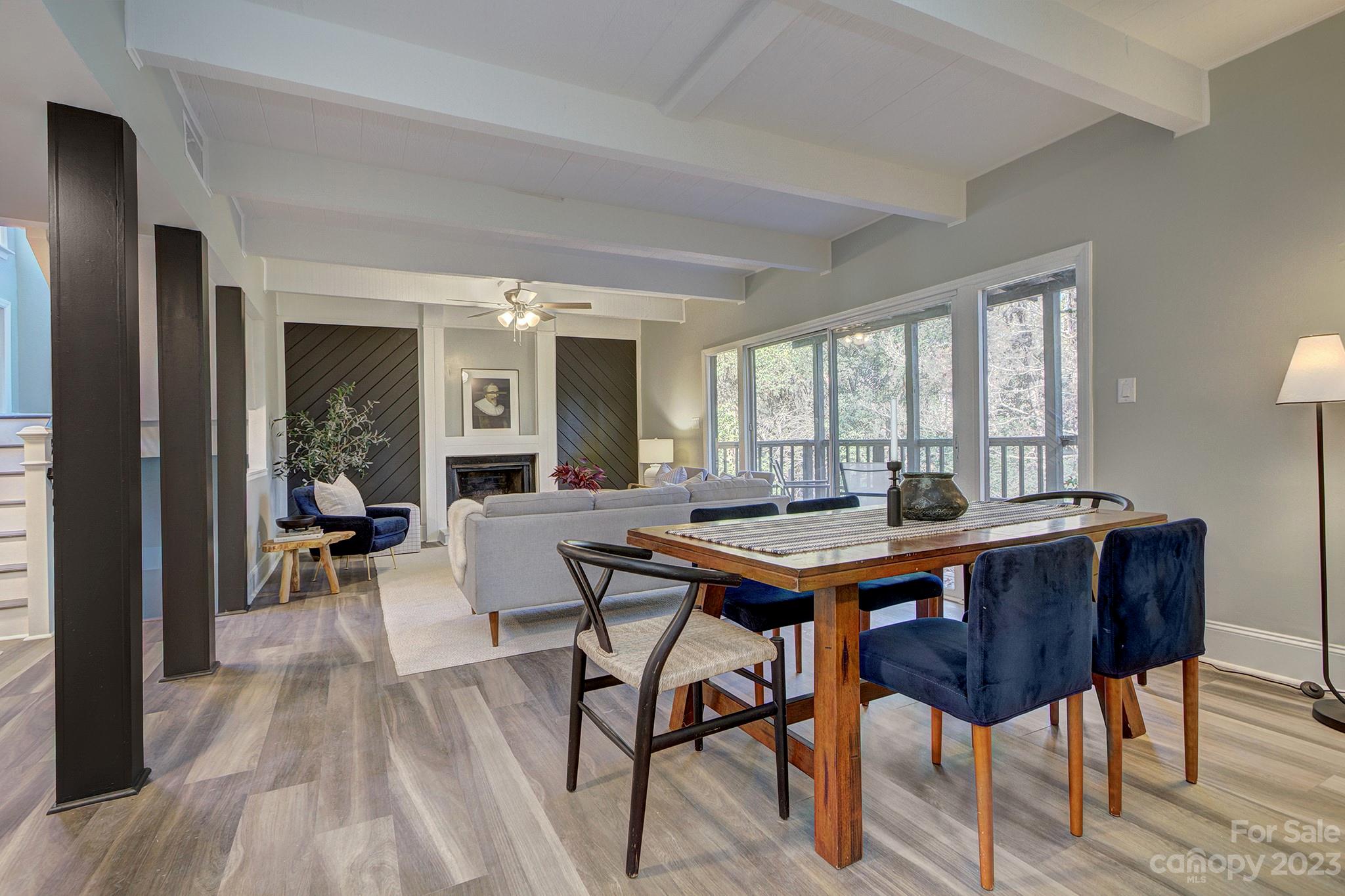 4719 Rounding Run Road Charlotte, NC 28277 - Photo 13 of 48 a view of a dining room with furniture window and wooden floor