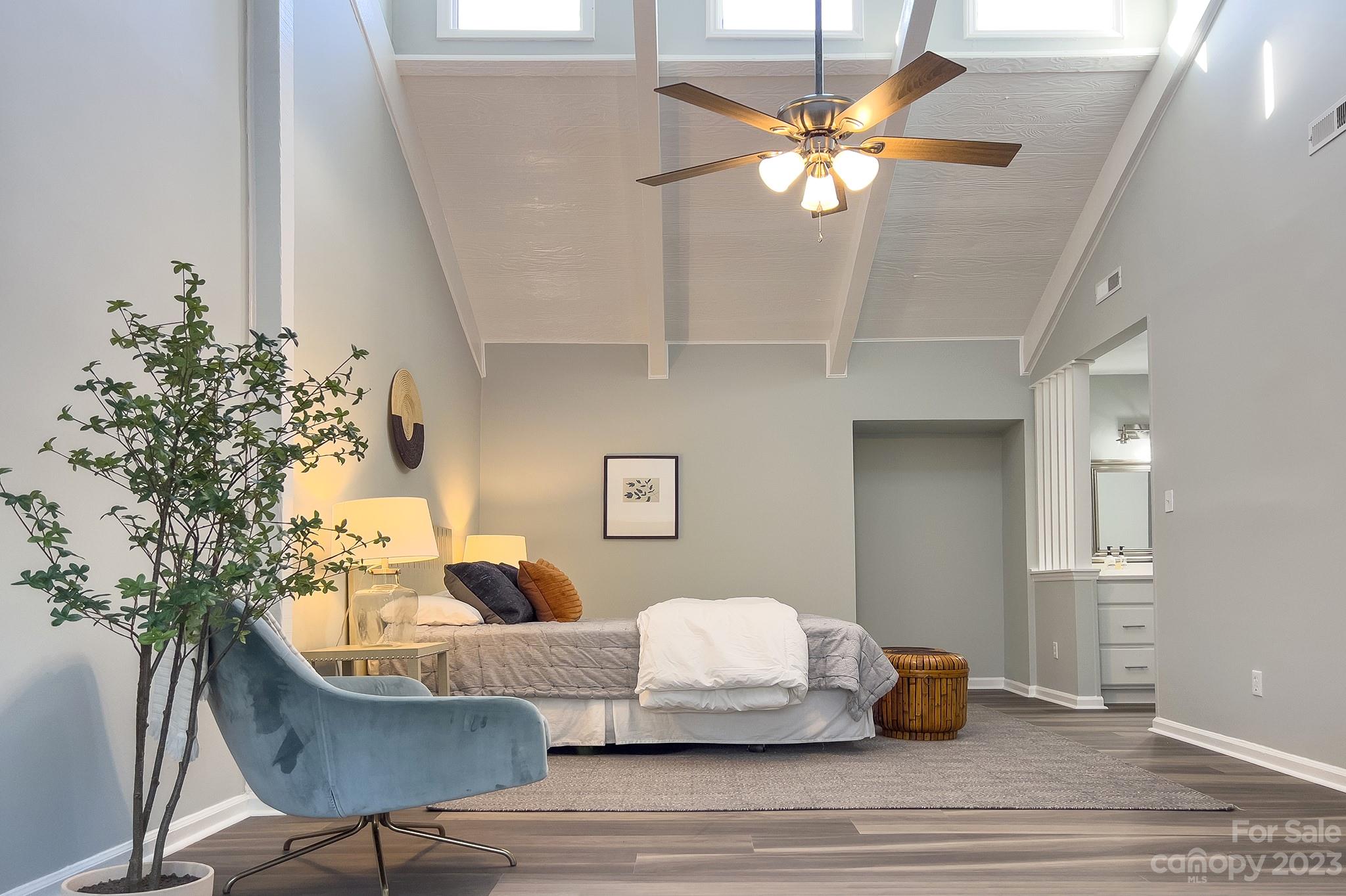 4719 Rounding Run Road Charlotte, NC 28277 - Photo 22 of 48 a living room with furniture and a chandelier