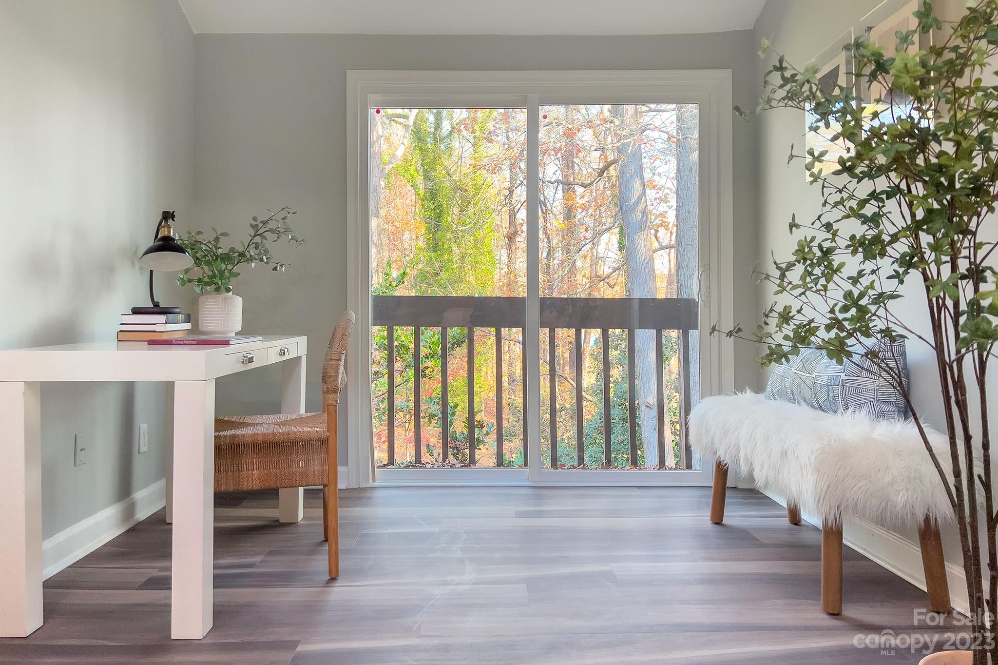 4719 Rounding Run Road Charlotte, NC 28277 - Photo 24 of 48 a view of a livingroom with furniture window and wooden floor