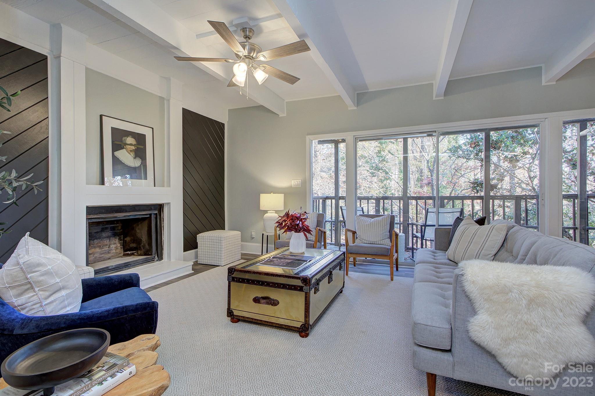 4719 Rounding Run Road Charlotte, NC 28277 - Photo 10 of 48 a living room with furniture and a fireplace
