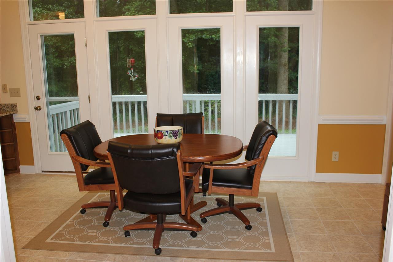 10509 New Arden Way Raleigh, NC 27613 - Photo 12 of 25 Breakfast Nook Opens to Deck & Backyard