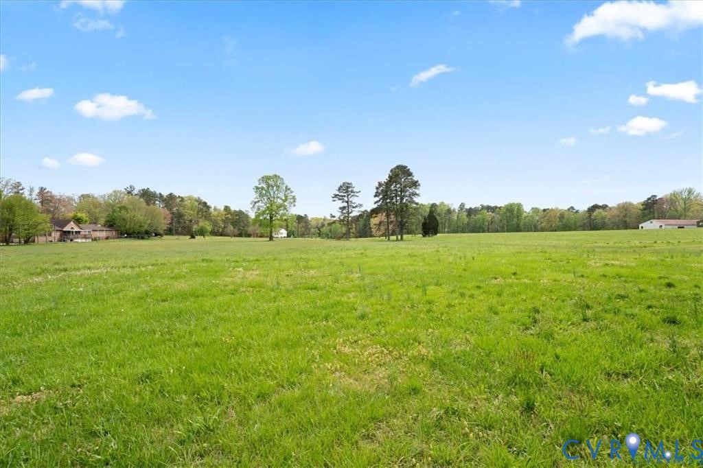9941 Reams Road North Chesterfield, VA 23236 - Photo 3 of 13 a view of a green field