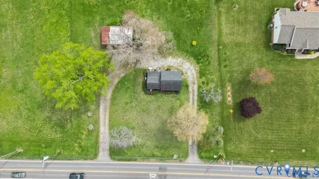 a view of a lake with a yard