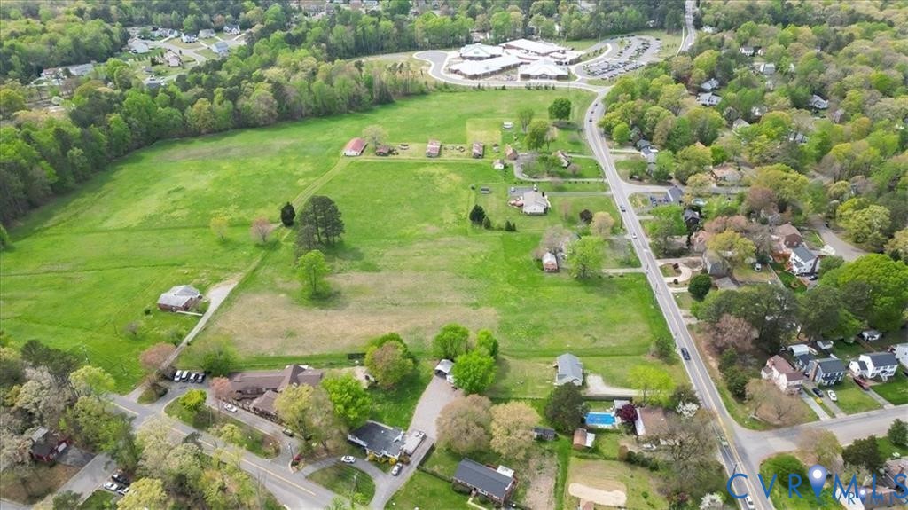9941 Reams Road North Chesterfield, VA 23236 - Photo 7 of 13 a view of a lake with a yard